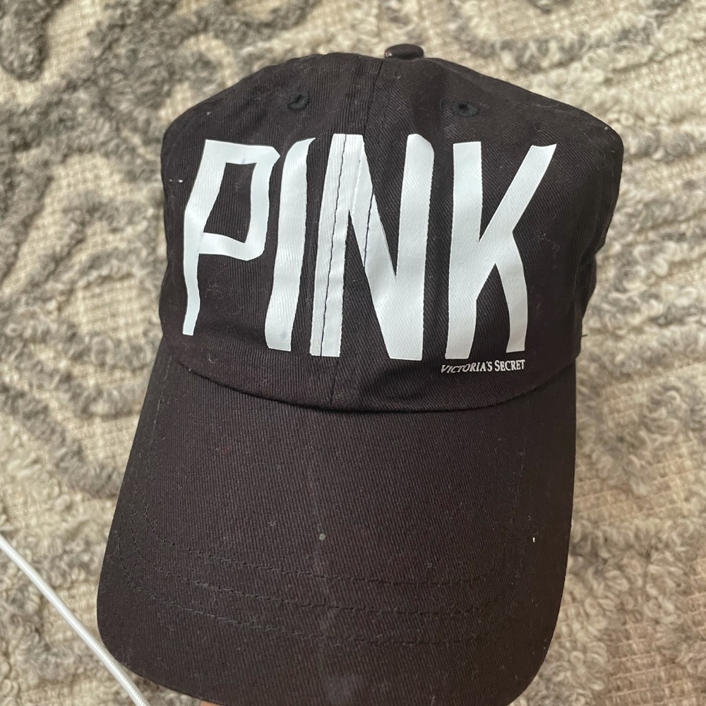 black, pink hat